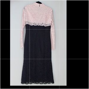 A light pink and black dress. From stylewe.com